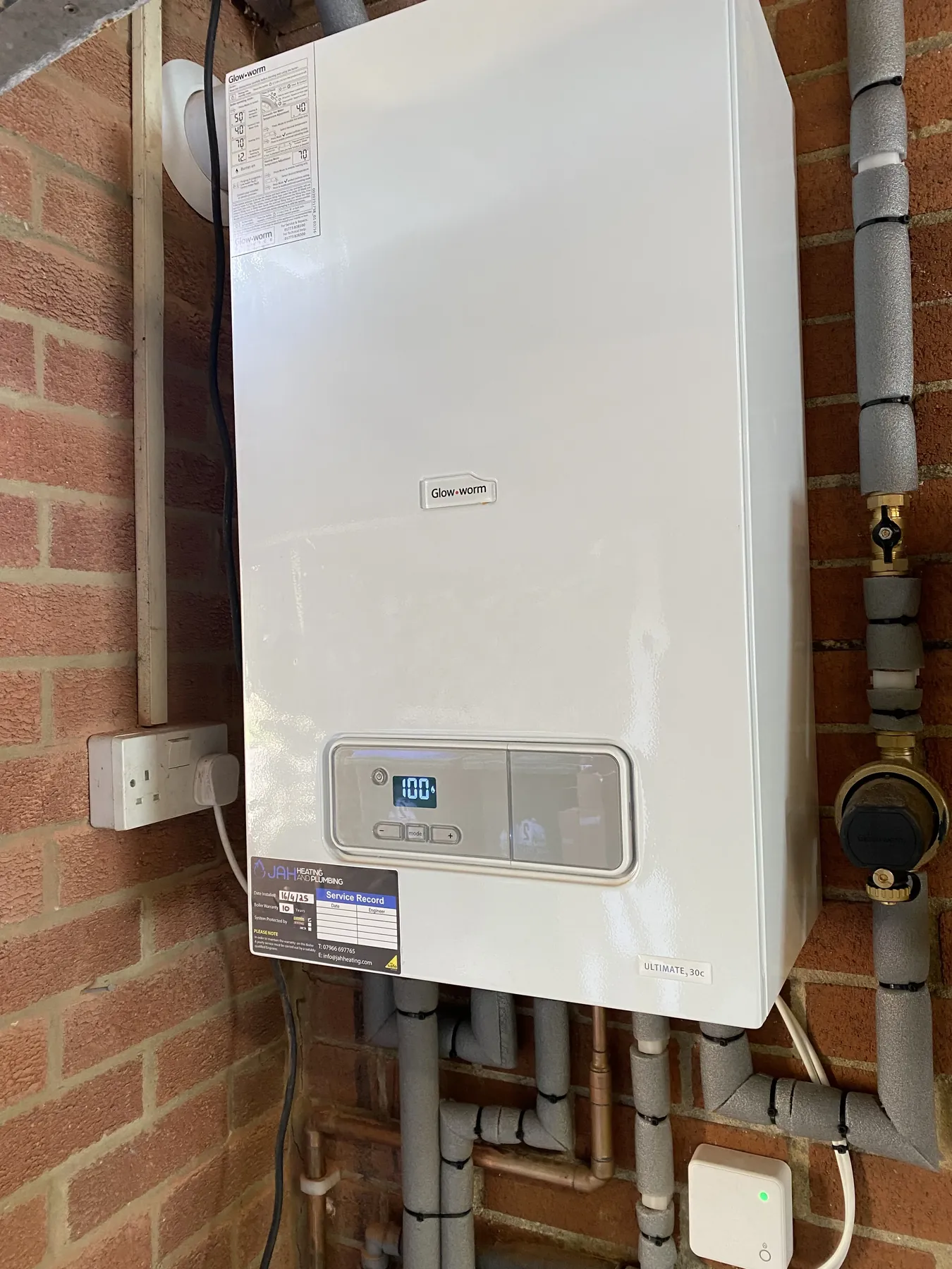 Installed Glow-worm boiler and insulated pipework